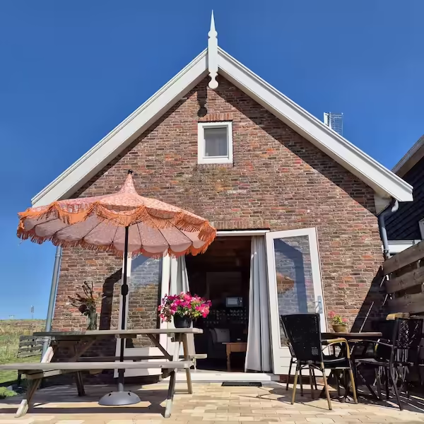 The terrace of the 'Achterhuis' (rear house) overlooking the polder